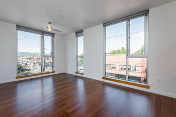 Central Eastside Lofts | Two Bedroom #302 Spacious Living and Dining Room with Floor to Ceiling Windows